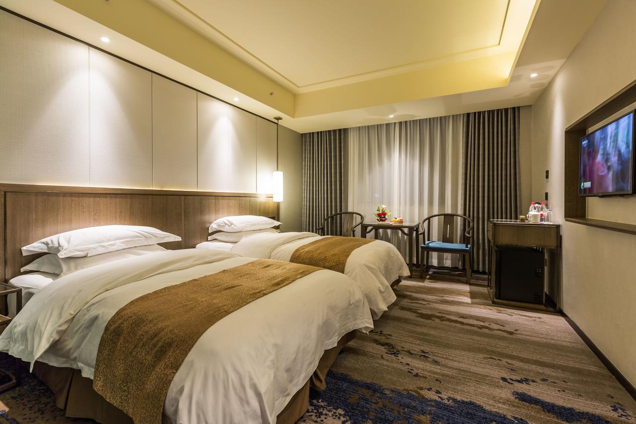 Oriental Hotel Tong Xiang Jiaxing Exterior foto